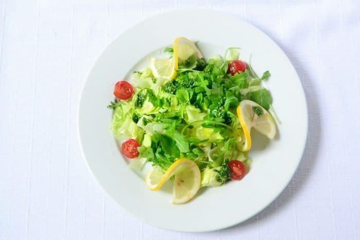 Green Vegan Salad on white plate