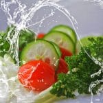4th of july vegan recipes: salad ingredients are doused in water to create the perception of freshness