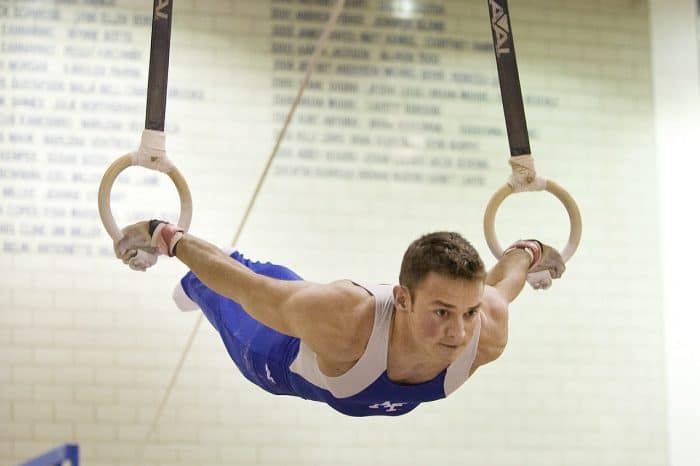 man performing a gymnastic routine
